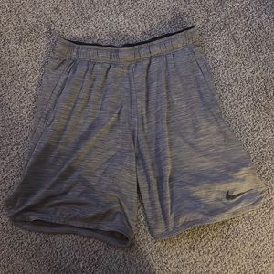 Nike heather gray gym shorts, size large 8” inseam.  Pre owned, great condition!